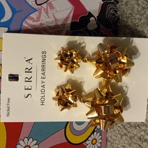 Metal holiday gold colored bow earrings